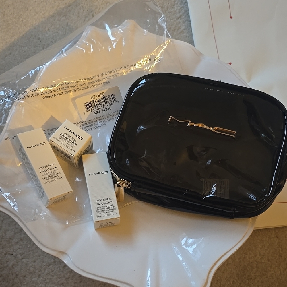 MAC Black Cosmetic Bag with Lip And Face Products